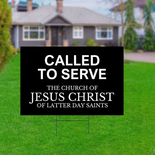 A 24"x18" Missionary Called To Serve Yard Sign in the grass in front of a house.