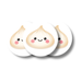 Round paper confetti pieces featuring a cute smiling dumpling design with rosy cheeks, shown in a small stacked arrangement on a white background.