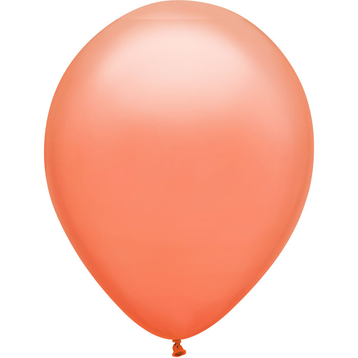 An inflated 11-inch Coral, Qualatex 11" Latex Balloon.