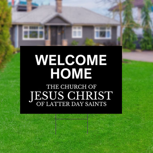 A 18" x 24" Missionary Welcome Home Yard Sign in front of a house.