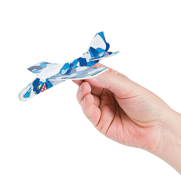 A hand holding one Colorful foam Glider.