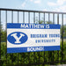 Banner with 'Matthew is Brigham Young University Bound!' text and BYU logo on a fence.