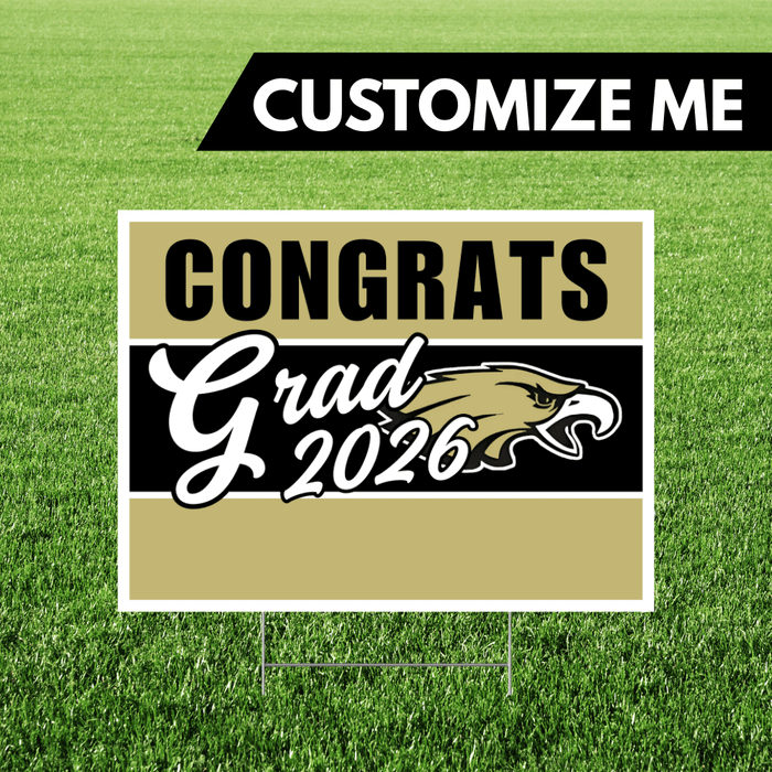 Graduation-themed sign with 'Congrats Grad 2026' on a grass background