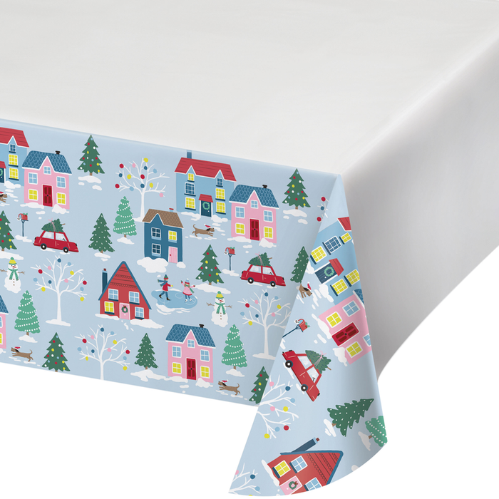 Transform any plain table into a festive holiday decor with the Christmas Village Paper Tablecover. This one-count tablecover features a colorful and cheerful Christmas village design, perfect for family meals or special events. Perfect for indoors or out, the plastic construction is strong, durable, and spill-proof. Easily clean up after events with a quick wipe.