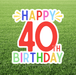 Happy 40th birthday yard sign featuring large red “40” text with colorful “Happy Birthday” lettering on a white cutout sign displayed in grass.