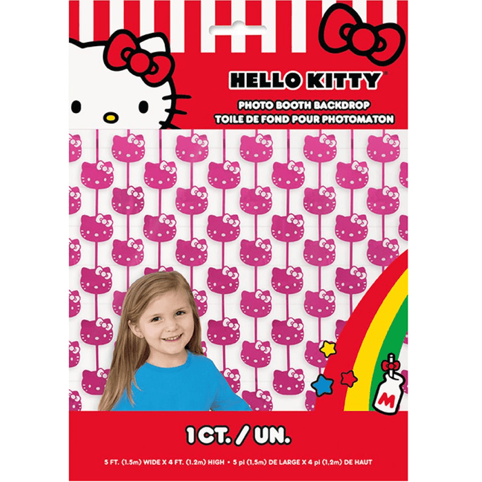 Hello Kitty photo booth backdrop with a child in front, featuring the brand's logo and design.