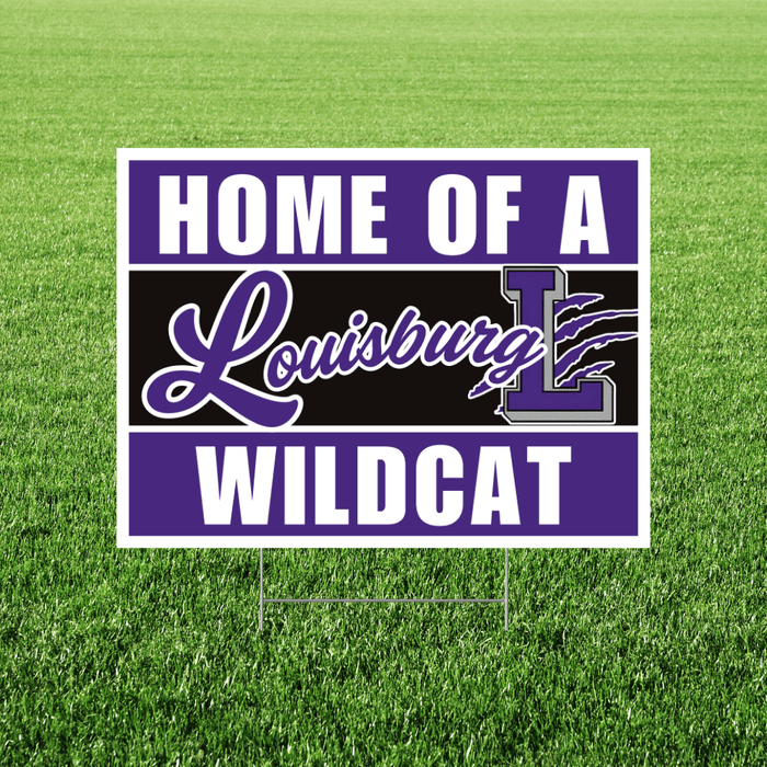 Sign with 'Home of a Louisburg Wildcat' text on a grass background