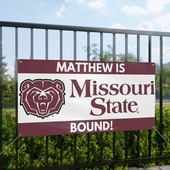Banner with Missouri State University logo and text on a fence
