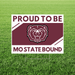 Sign with bear logo and text 'Proud to be Mo State Bound' on a grass background