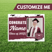 Graduation-themed customizable sign with a photo of a graduate on a grass background