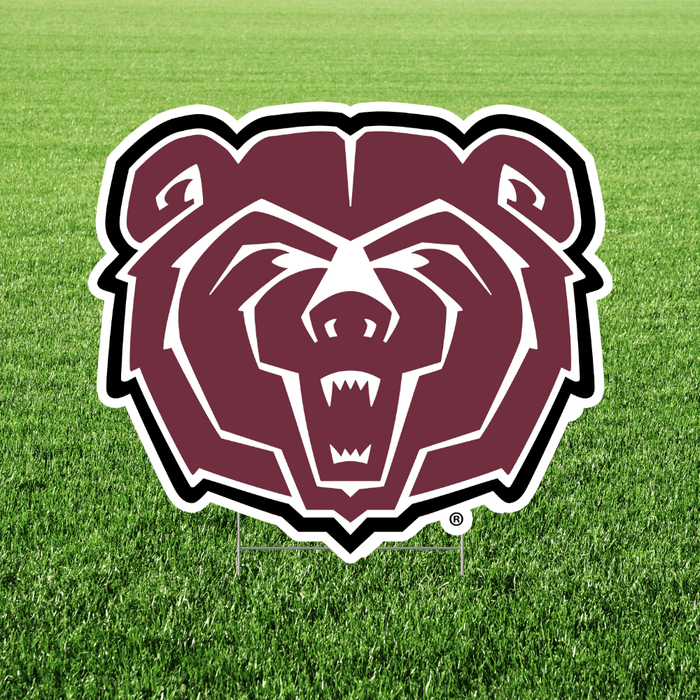 Bear logo on a grass field