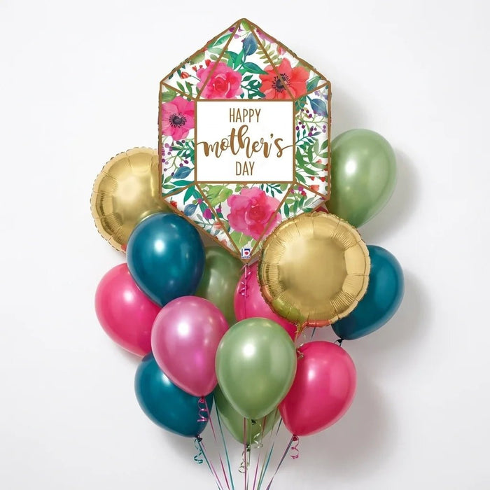 Mother’s Day balloon bouquet featuring a floral greenhouse-shaped “Happy Mother’s Day” balloon, gold round foil balloons, and assorted pink, teal, and green latex balloons.