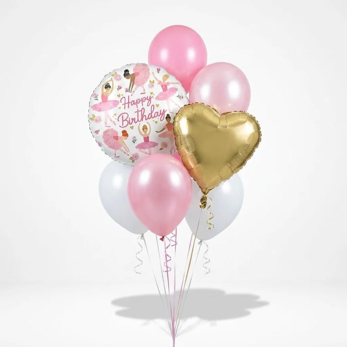Ballerina birthday balloon bouquet featuring a round “Happy Birthday” foil balloon with ballerina illustrations, a gold heart-shaped foil balloon, and classic pink, white, and pearl pink latex balloons with curling ribbons.
