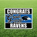 Graduation-themed sign with 'Congrats Grad 2026 Ravens' on a grass background