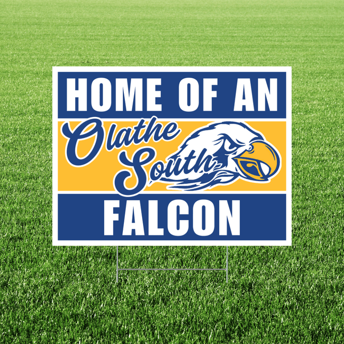 yard sign with 'Home of an Olathe South Falcon' text and eagle logo on grass
