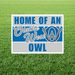 Sign with 'Home of an Olathe West Owl' text and logo on a grass background