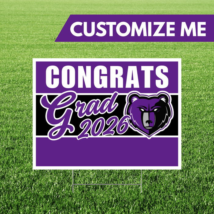 Graduation-themed sign with 'Congrats Grad 2026' on a grass background