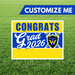 Graduation-themed customizable sign with 'Congrats Grad 2026' on a grass background
