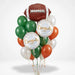 Football congratulations balloon bouquet featuring a large football-shaped foil balloon, two round “Congrats” foil balloons, and green, burnt orange, and white latex balloons with curling ribbons.