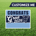Graduation-themed customizable sign with 'Congrats Grad 2026' on a grass background