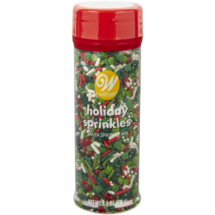 A 3.8 oz container of Christmas Santa Hat and Green Tree Sprinkle Mix.